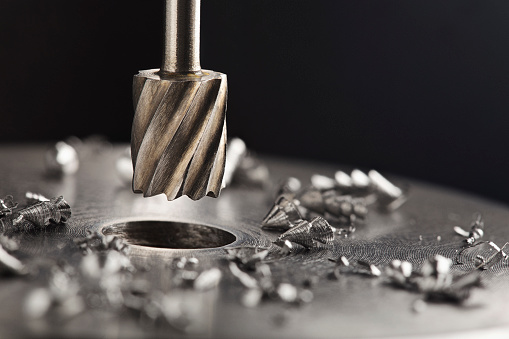 Milling cutter make sink in hole in steel billet. Locksmith work.